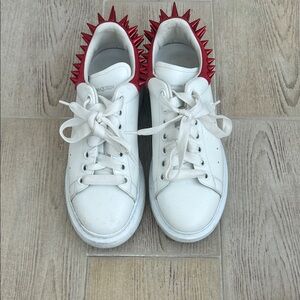 Alexander McQueen Womens White Leather Sneakers with Red Spike Heel Trim